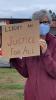 A participant in a Social Justice Vigil in Grand Marais last August. WTIP File Photo by Rhonda Silence 